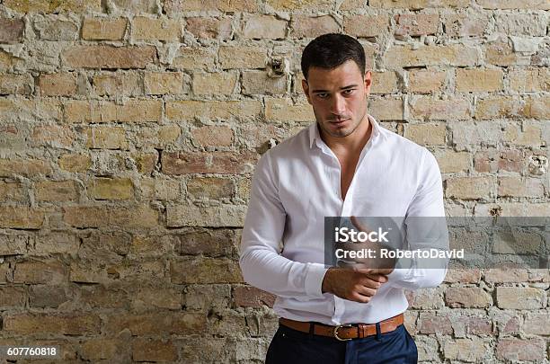 Portrait Businessman Posing In Front Of The Old Wall Stock Photo - Download Image Now