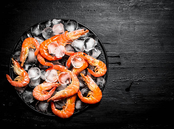 istock Shrimp with ice on the plate. 607761558