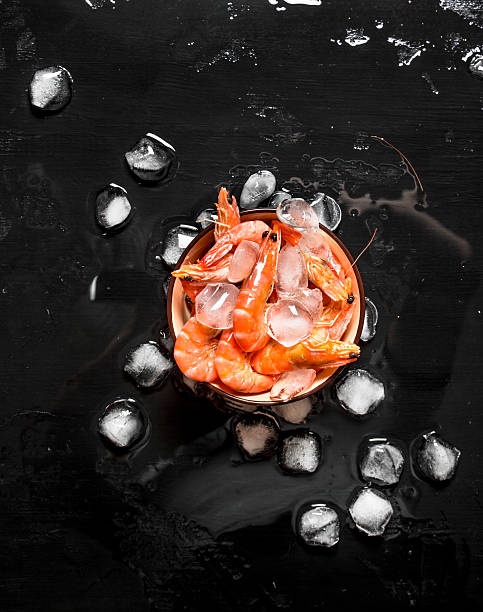istock Shrimp with ice in a bowl. 607761804