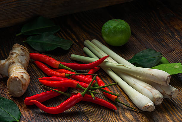 istock Mini chili peppers, galangal root, kaffir lime and lemongrass 607762460