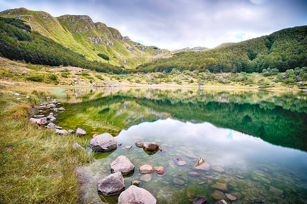 istock Mountain lake in the Italian Alps 607765998