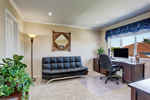 istock Luxury interior of home office with black leather sofa 607766426