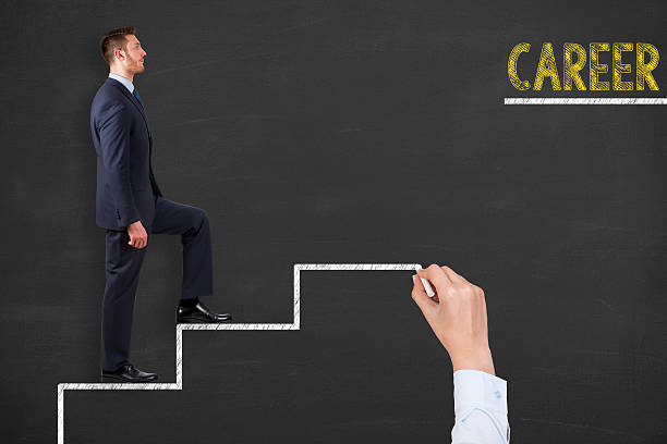 istock Career Teamwork Stairs on Blackboard Background 607768894