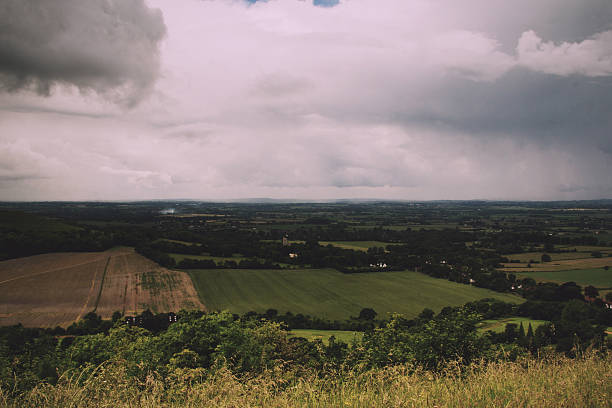 istock Cloudy view over the Chilterns in Buckinghamshire Vintage Retro 607769566