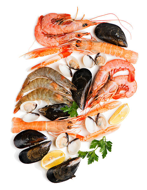 istock Assortment of raw seafood, above view. 607770524