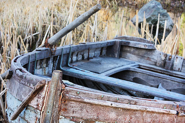 istock Rowboat Dinghy Skiff Rotting Boat Hull 607771074
