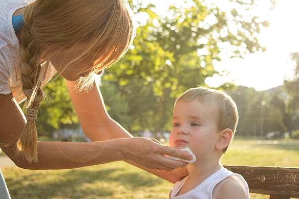 istock Mother cleans the baby 607771186