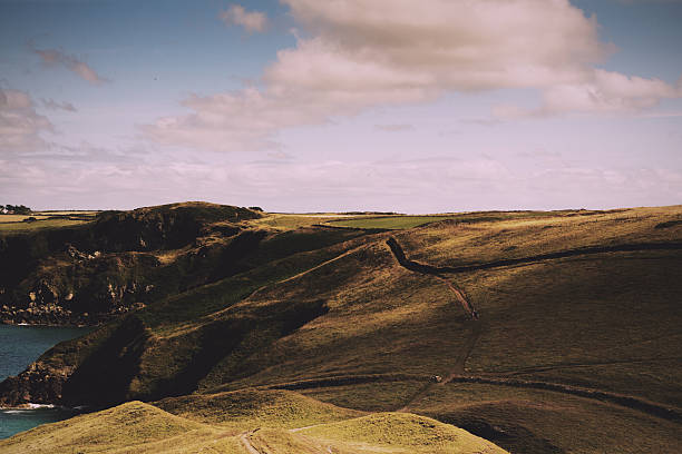 istock View from the costal path near Polzeath. Vintage Retro Filter. 607773202