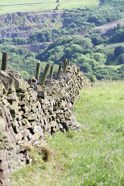 istock old stone wall in Peak District UK 607773460