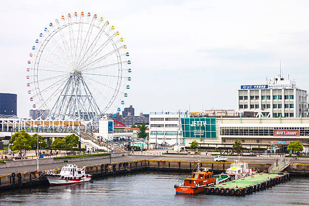 Nagoya, Japan - May 23, 2015: View to Nagoya Port - Nagoyako. This part of large port, the Garden Pier, has been redeveloped as a leisure district and offers an aquarium, shopping mall, amusement park, museums and green space.