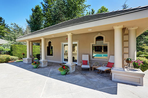 View of luxury guest house with column porch. View of luxury guest house with column porch. American Suburban house exterior.Northwest, USA bed and breakfast stock pictures, royalty-free photos & images