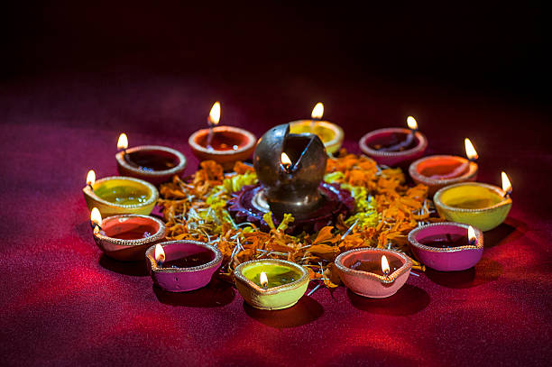 istock Clay diya lamps lit during Diwali Celebration. Greetings Card Design 607775684