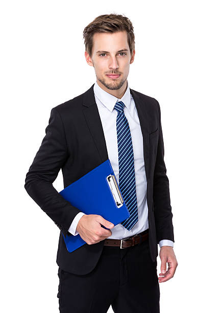 istock Businessman holding a clipboard 607777134