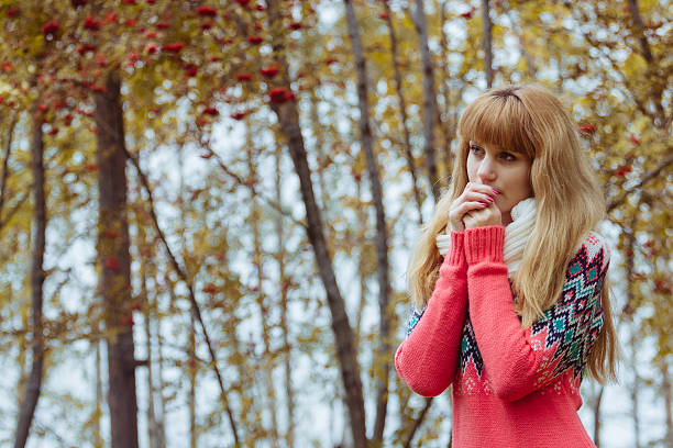 istock Fall concept - autumn woman in park 607874422