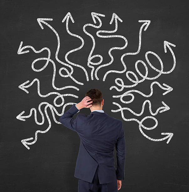 istock People feeling confusion and chaos on blackboard 607878216