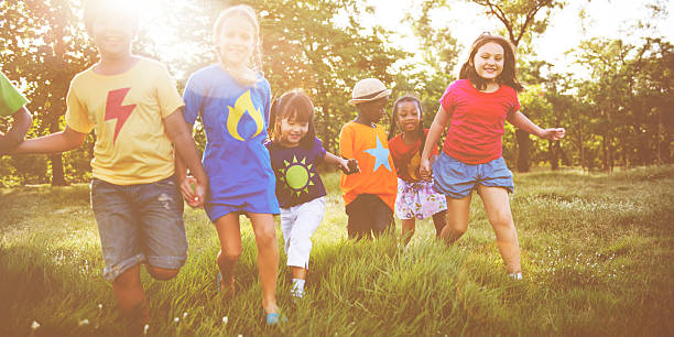 istock Children playing in the park Happiness Concept 607882628