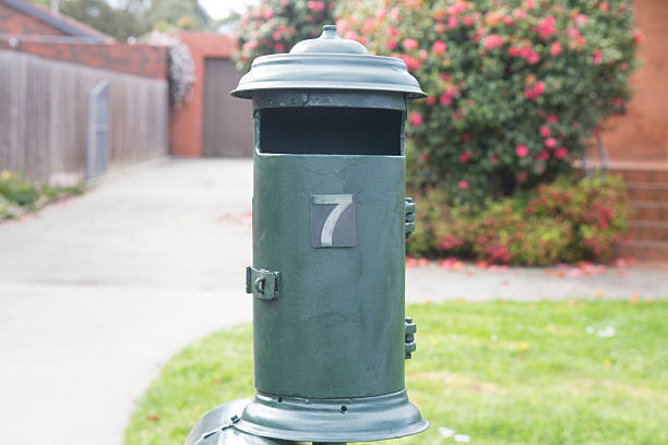 istock Green house mailbox number seven. 607882760