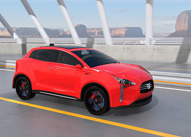istock Red electric SUV driving on arc bridge 607883342