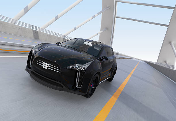 istock Black electric SUV driving on arc bridge 607883554