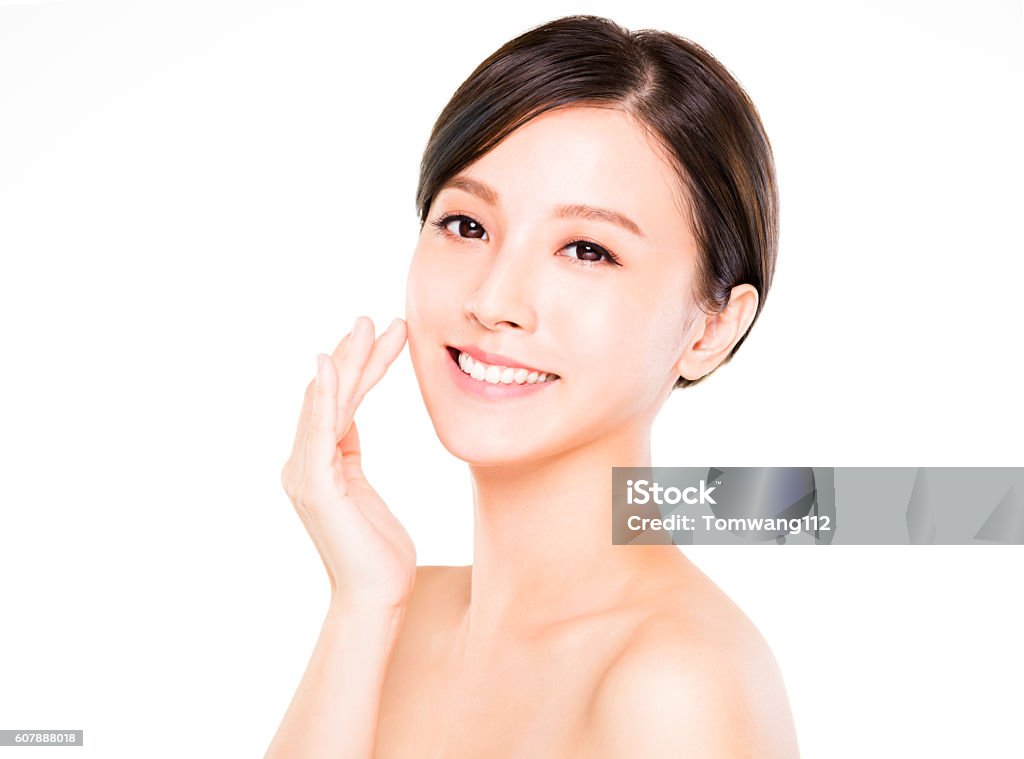 closeup   young  woman smiling face with clean  skin Beauty Stock Photo