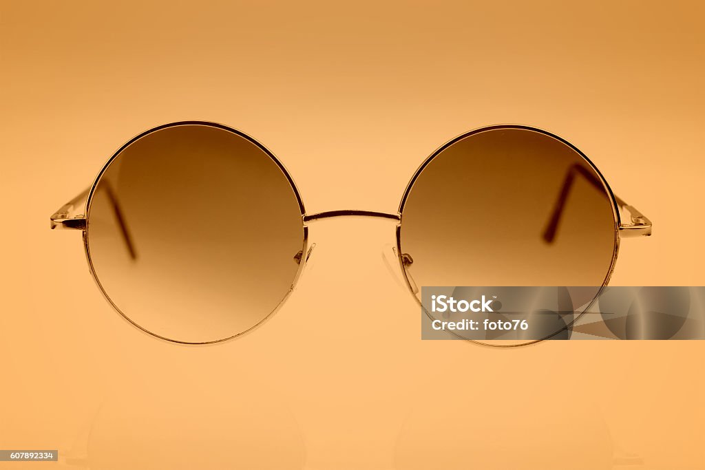 Eyeglasses on brown background Arts Culture and Entertainment Stock Photo