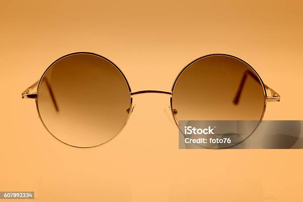 Eyeglasses On Brown Background Stock Photo - Download Image Now - Arts Culture and Entertainment, Brown, Close-up