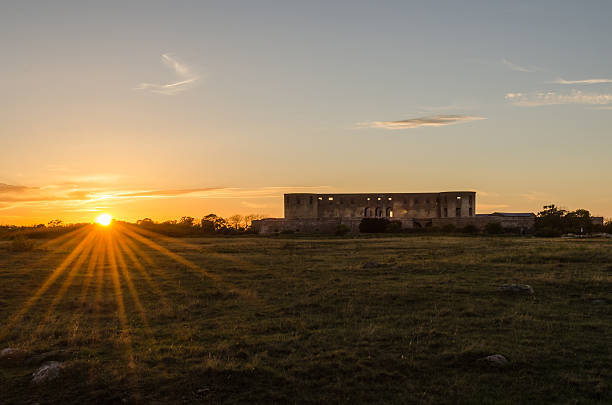 Borgholm, Sweden - August 27, 2016: Sunset by the old Borgholm Castle at the swedish island Oland in Sweden. This castle ruin is the landmark of the city of Borgholm.