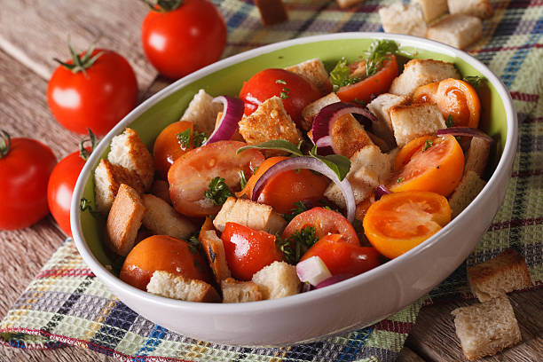 istock Italian bread salad - panzanella close-up on the table. horizontal 607894852