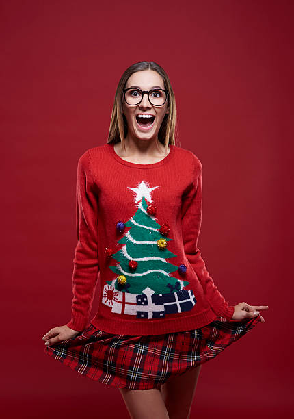 забавная девушка в рождественское время - cardigan стоковые фото и изображения