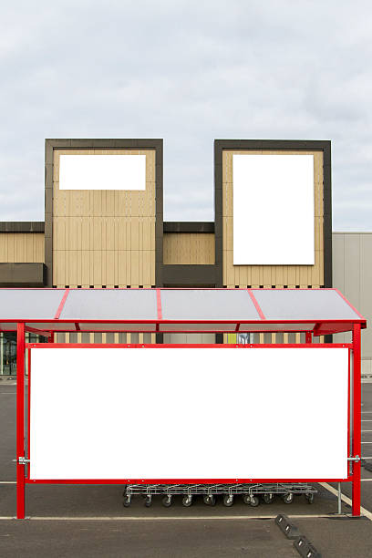 istock Mock up. Supermarket or store billboard and shoping trolley bay 607899882
