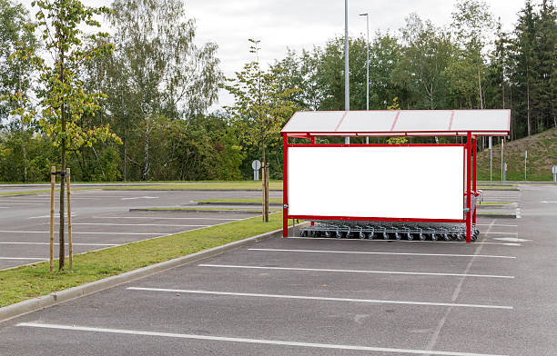 istock Mock up. Shopping carts return point on a parking lot. 607900156