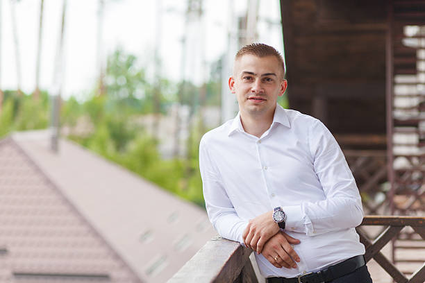 istock Attractive and handsome businessman 607904968
