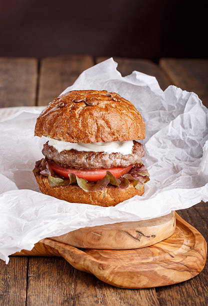 istock Close-up of homemade burger 607908244