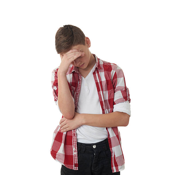 istock Cute teenager boy over white isolated background 607911226