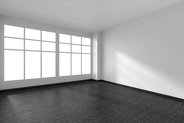 istock Empty room with black parquet floor, white walls and window 607911886