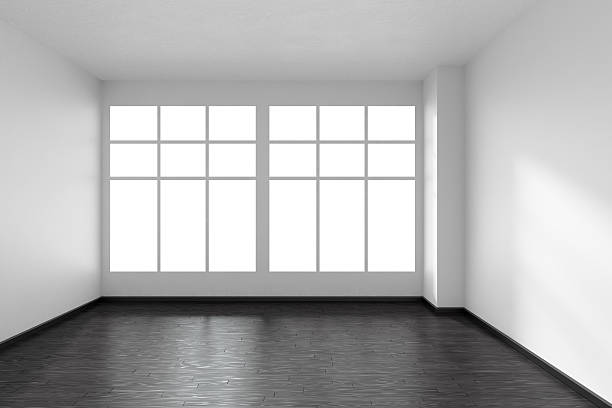 istock Empty room with white walls, black parquet floor and window 607911956