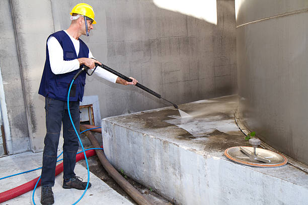 istock electrician and general worker washing  the floor 607913004