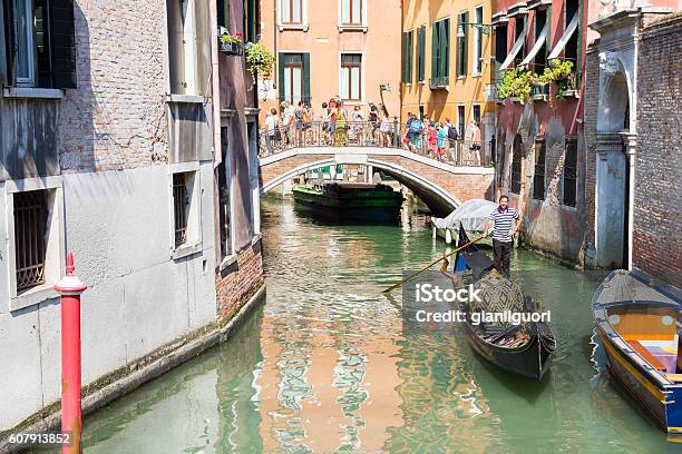 Tourists Enjoying The Gondolas In Venice Italy Stock Photo - Download Image Now - Ancient, Architecture, Bridge - Built Structure