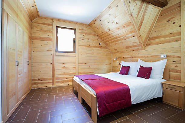 istock Bedroom in modern style log house 607915240