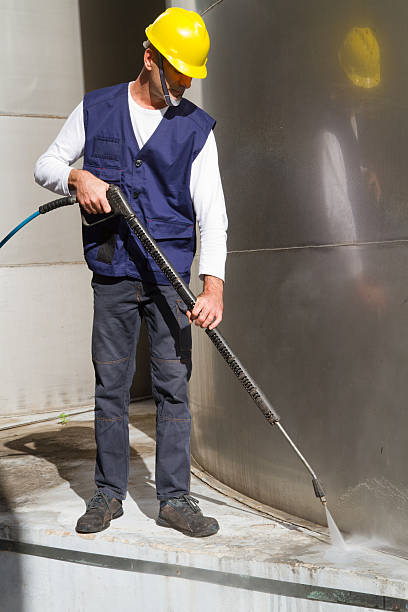 istock electrician and general worker washing  the floor 607916282