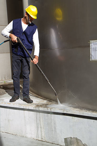 istock electrician and general worker washing  the floor 607916534