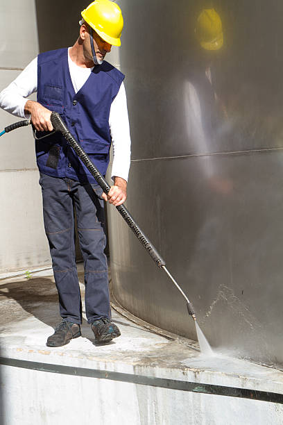 istock electrician and general worker washing  the floor 607916606
