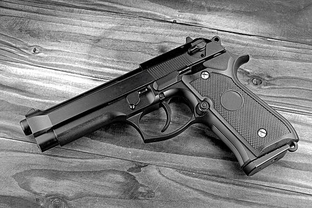 weapon series. modern u.s. army handgun m9 pistol - m9 imagens e fotografias de stock