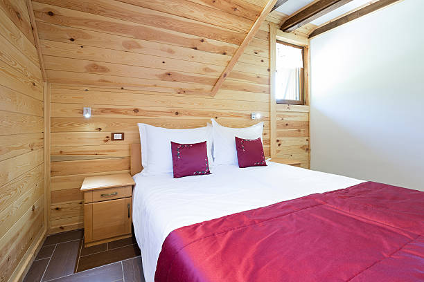 istock Bedroom in modern style log house 607917146