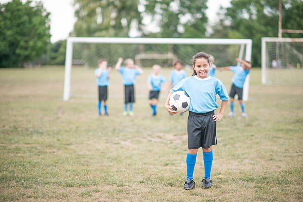 istock Children Playing Soccer After School 607917268