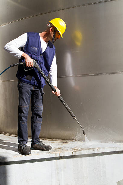 istock electrician and general worker washing  the floor 607917444
