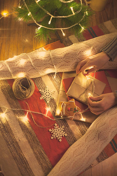 istock Woman packing Christmas gifts 607917846
