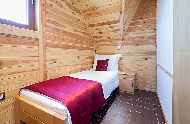 istock Bedroom in modern style log house 607918360