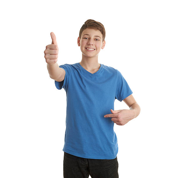 istock Cute teenager boy over white isolated background 607918880