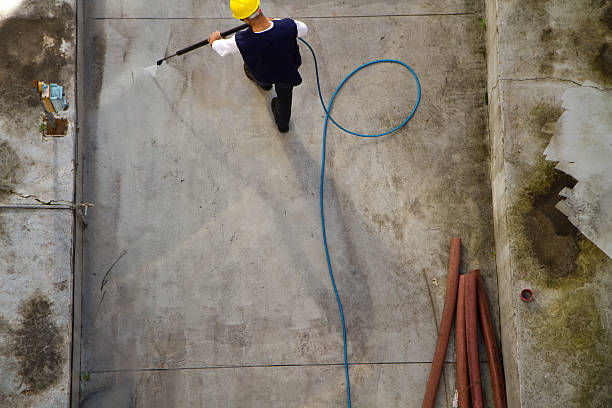 istock electrician and general worker washing  the floor 607919160